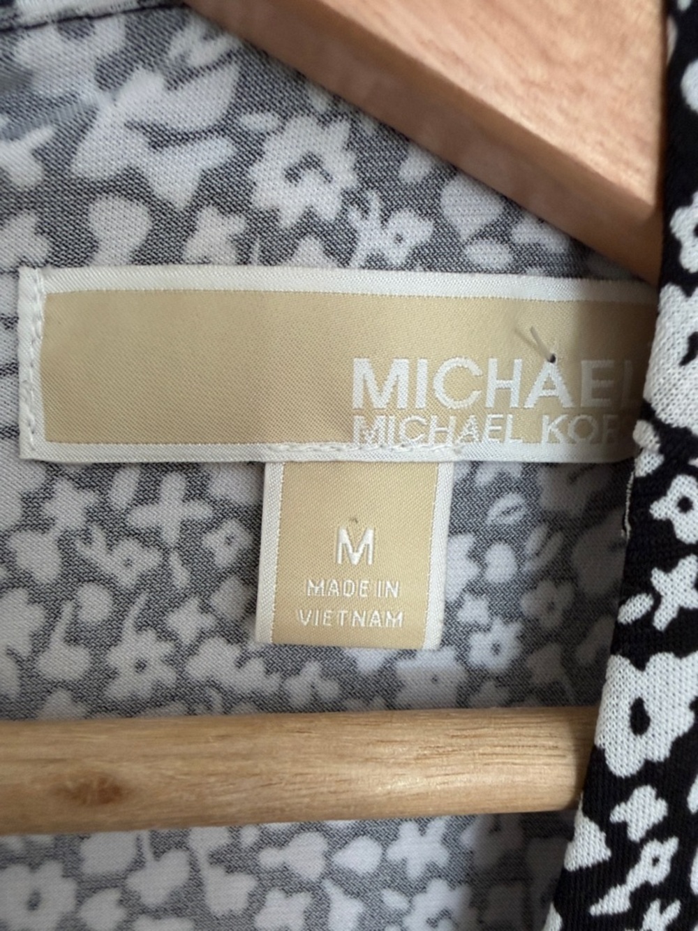 Michael Kors Black and White Floral Sleeveless Jumpsuit with Side Tie - Picture 2 of 5